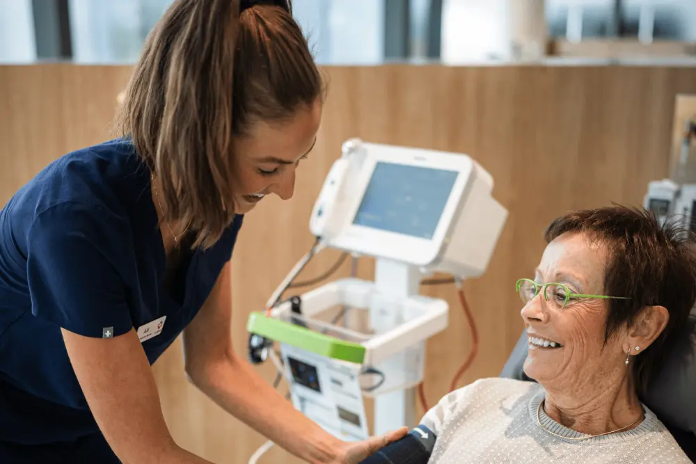 PFMCC_Nurse_with_pt_in_treatment_chair.png