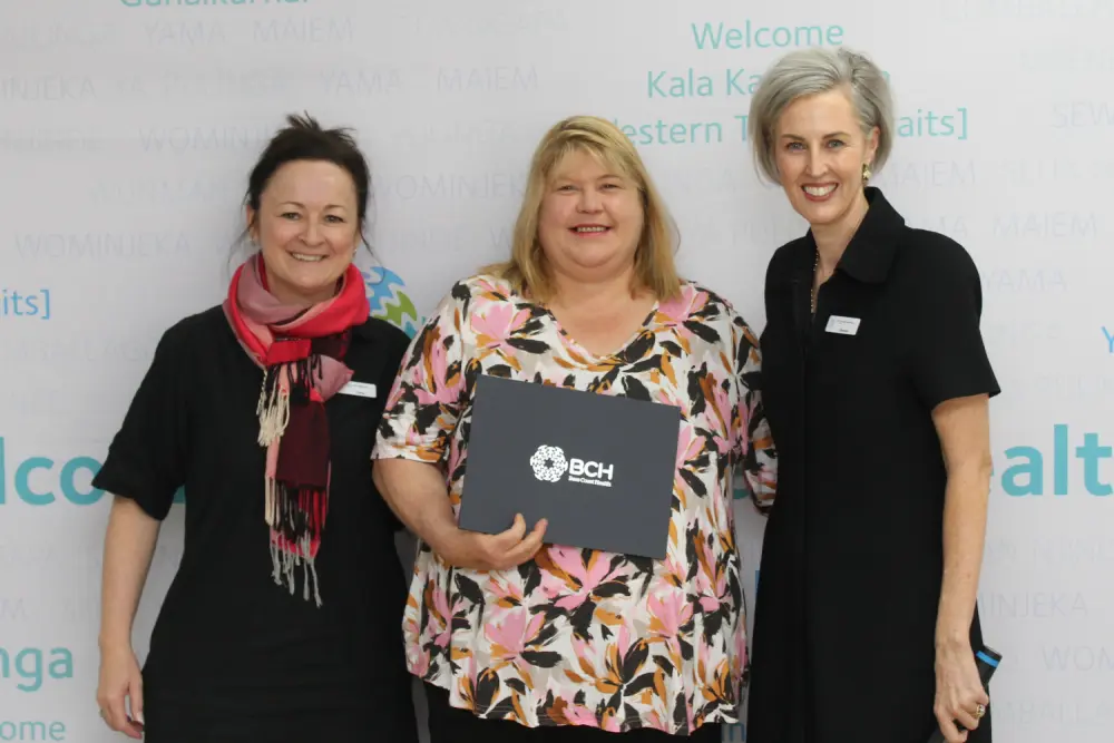 Enrolled Nurse Melinda Milkins, centre, received a 35-year service award from Chief Operating Officer/Director of Nursing Christine Henderson, left, and Interim CEO Simone Alexander.