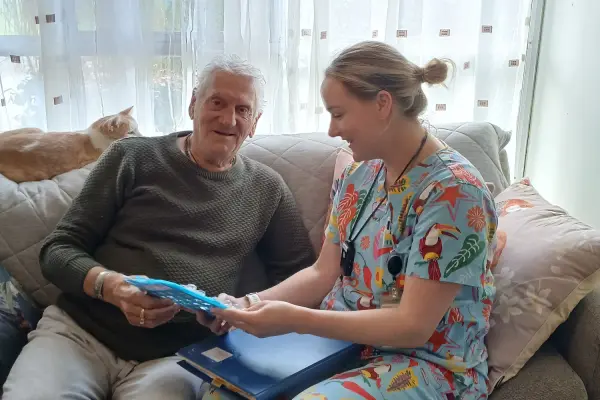 Bass Coast Health District Nurse Georgie Young checks on client John Christensen in his home