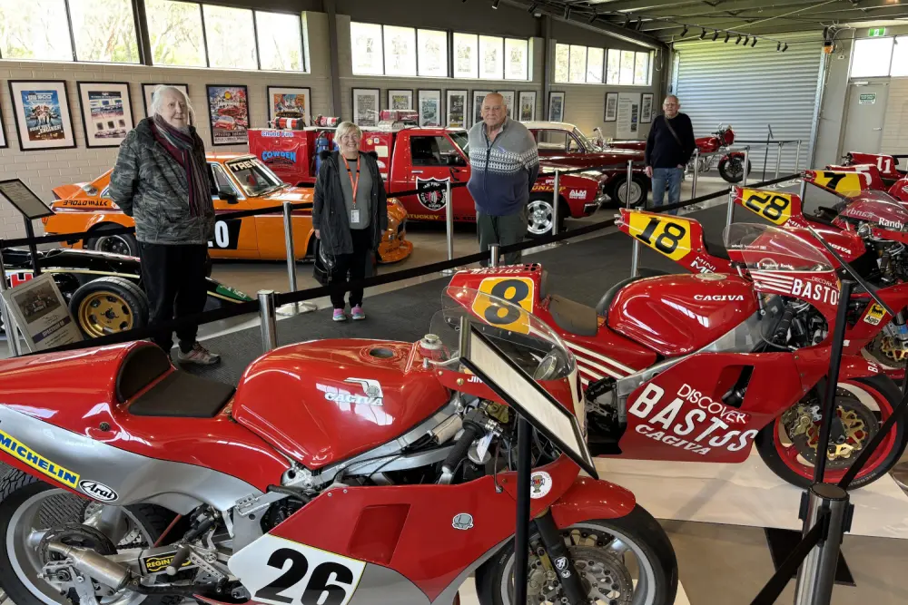 Members of the Bass Coast Health Social Support Group enjoy an outing to the Phillip Island Circuit’s History of Motorsport Display. From left, Don Riegel, Allison Braden from BCH, Richard Casbolt and David Rankin.