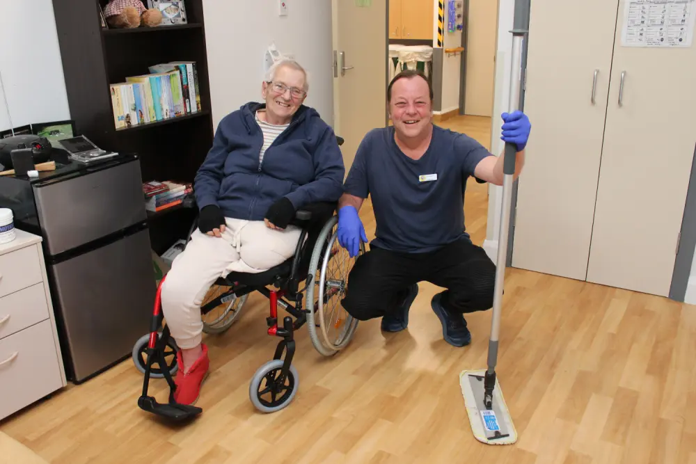 Kirrak House Cleaner Cameron Geer keeps Mavis Baird’s room tidy at Kirrak House residential aged care home at Wonthaggi.