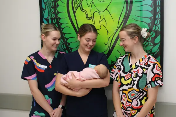 Among the Bass Coast Health Maternity team caring for women are, from left, Student Midwife Amber Turner, Midwife Hayley Furmage with baby Kira Phillip and Midwife Eden Roney.